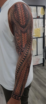 Fijian full arm tattoo