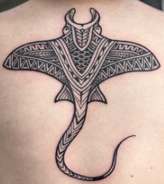 Black and white stingray back tattoo