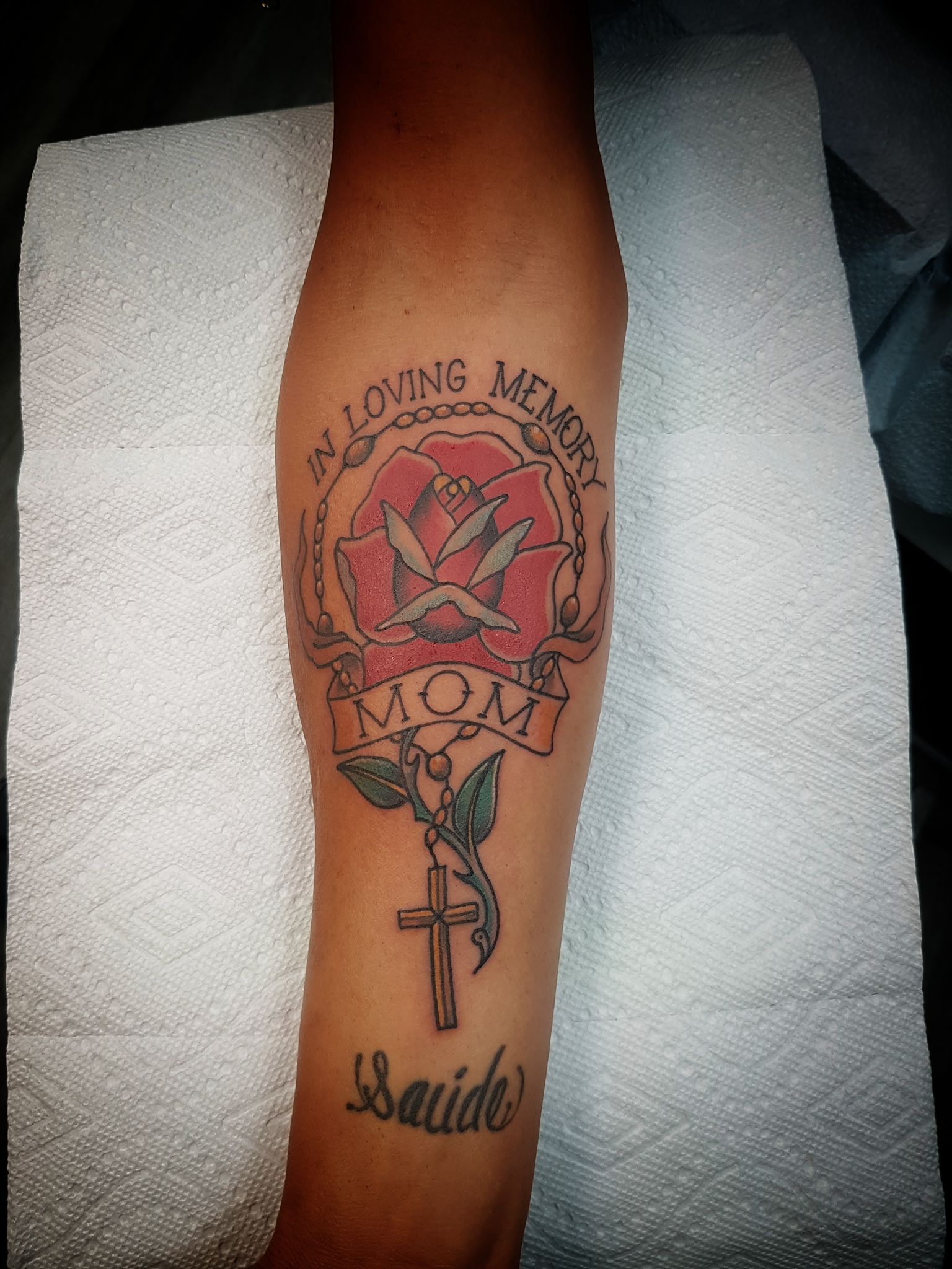 Script arm tattoo