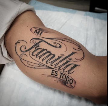Script arm tattoo