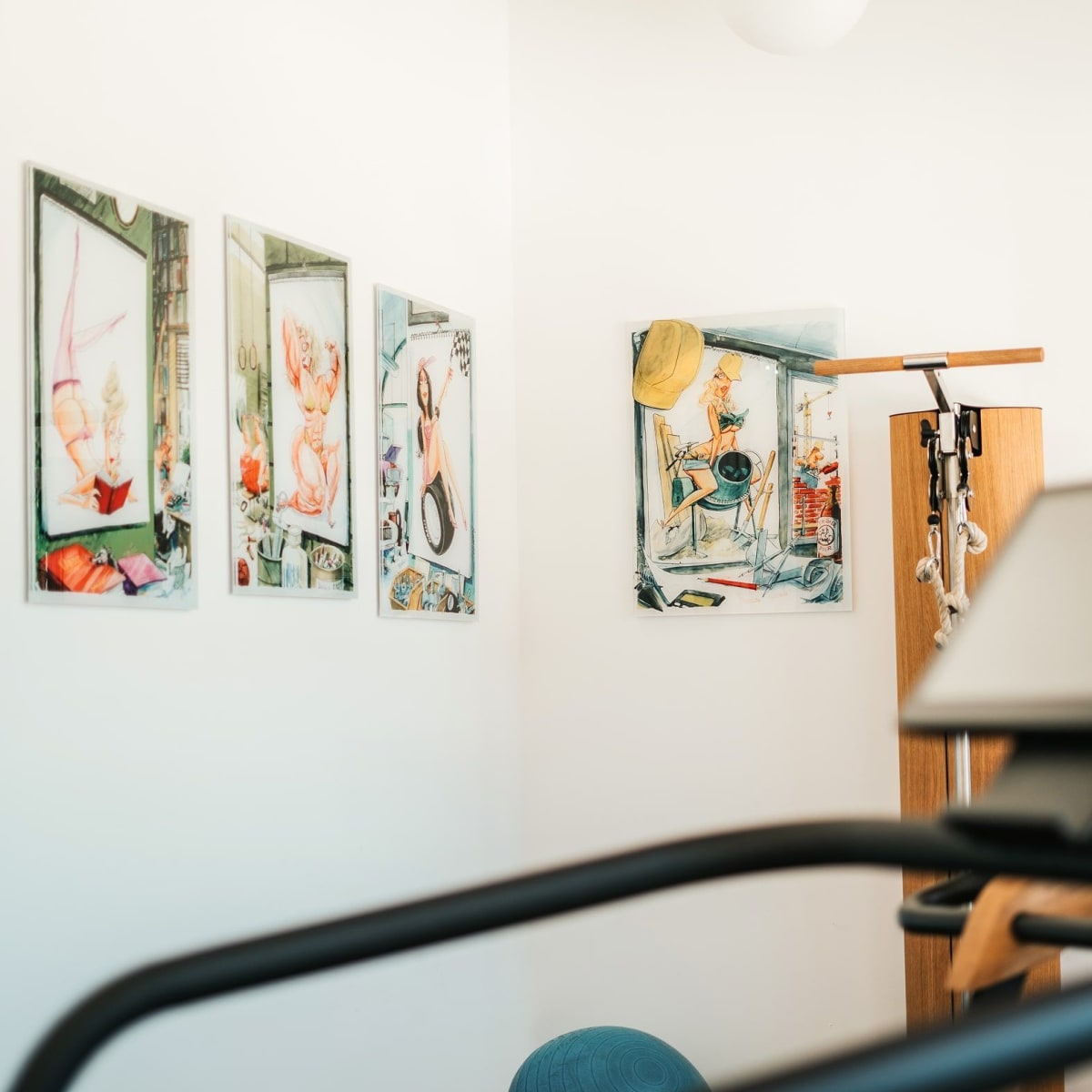 Artwork on the wall showcases a creative space in the Glemmtalerhof in Hinterglemm.