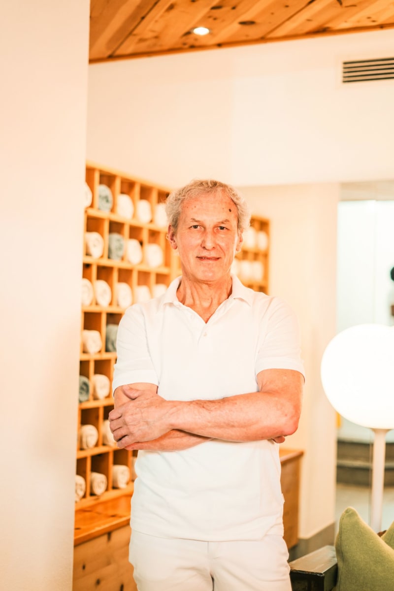 A person stands indoors at the Glemmtalerhof in Hinterglemm.