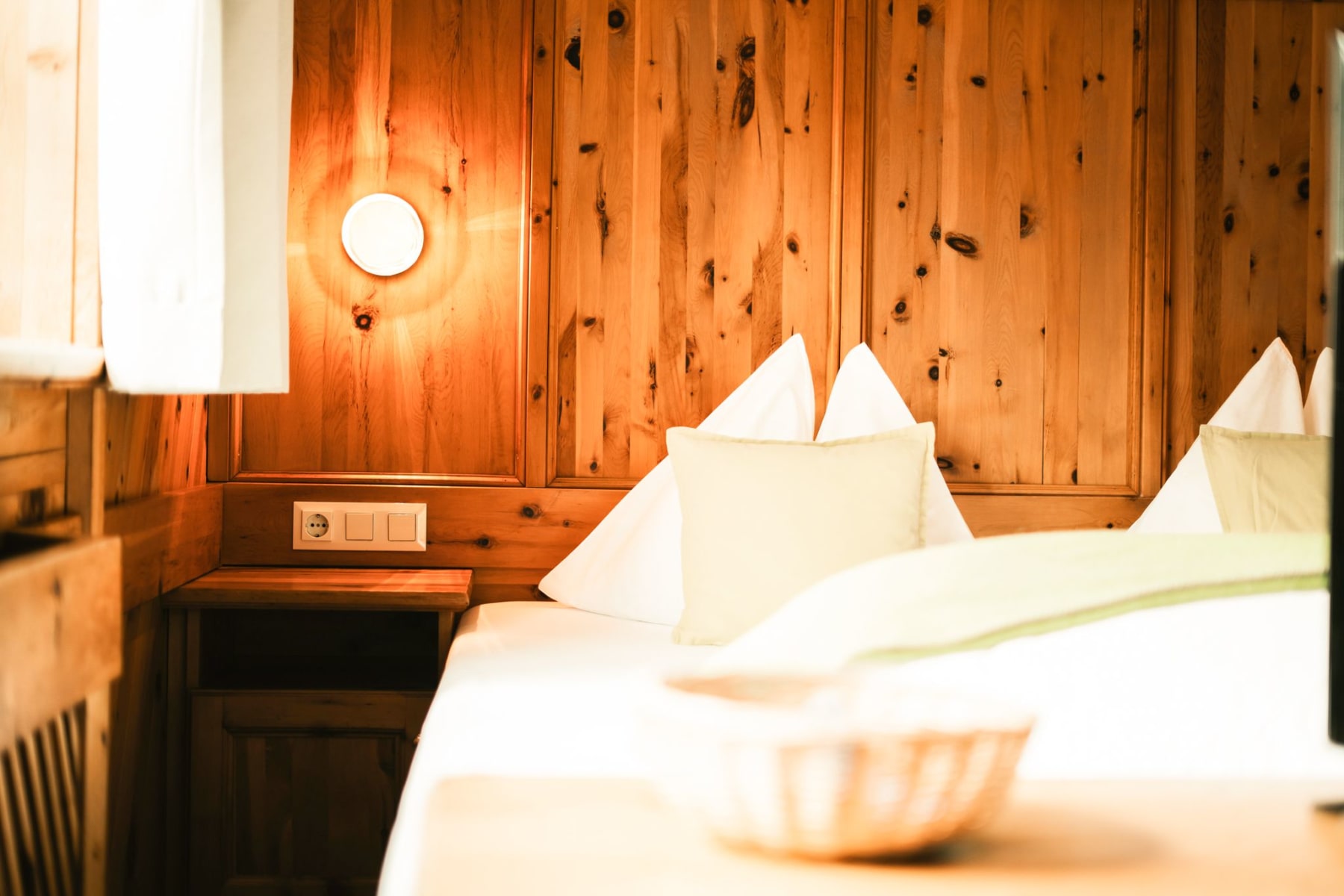 Cozy room in Glemmtalerhof in Hinterglemm featuring wood paneling and modern accents.