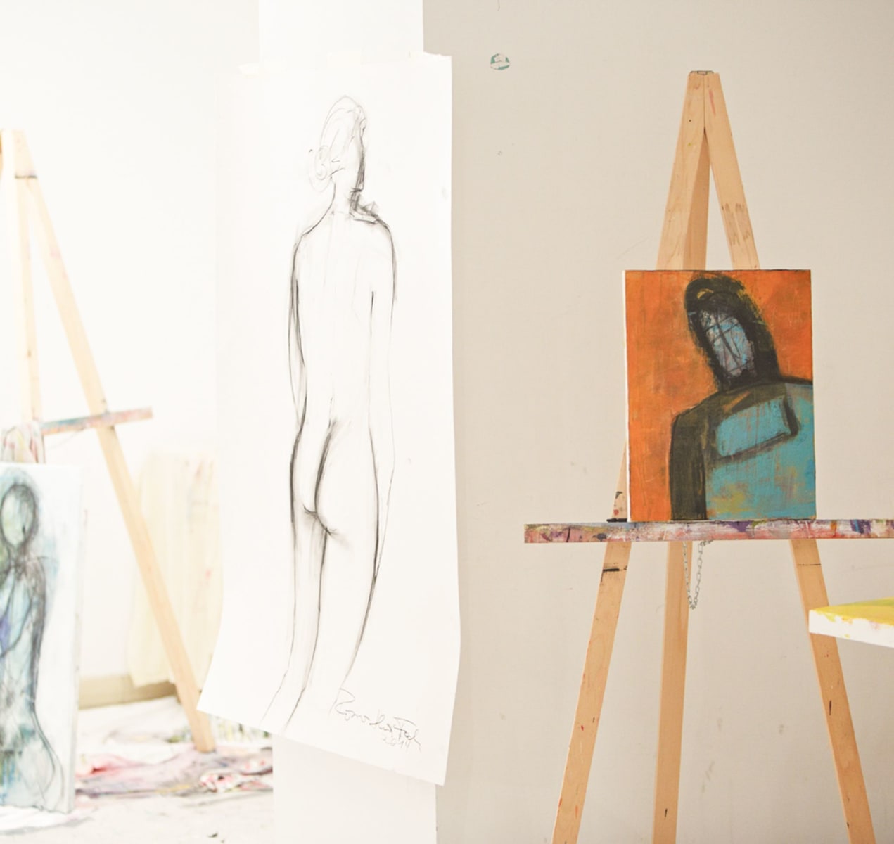 Glemmtalerhof in Hinterglemm, creative artworks on easels in a studio.