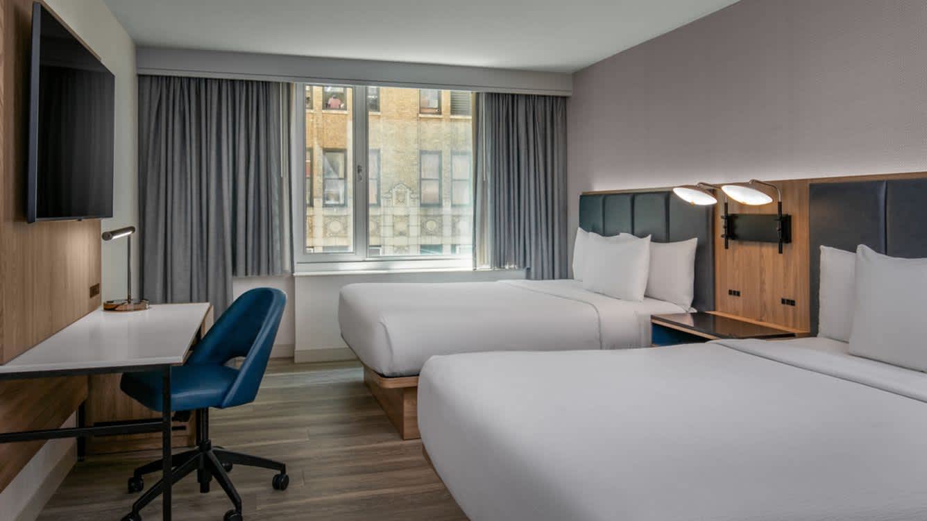 cy-nycet-double-queen-guest-room-12362_Wide-Hor