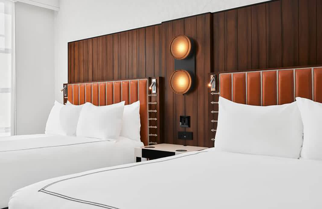 KH-TGD-queen-queen-guest-room-headboard-angle