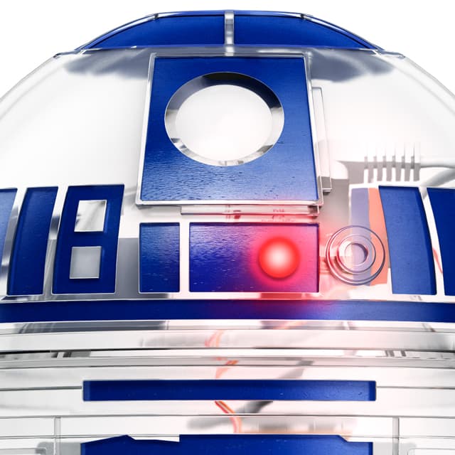 Starwars R2D2 by Littlebits, front close up with red light on, case transparent and blue stickers