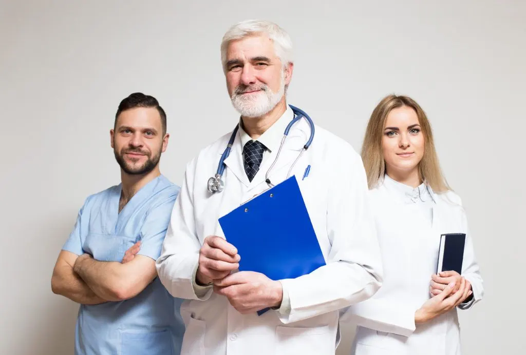 happy doctors standing