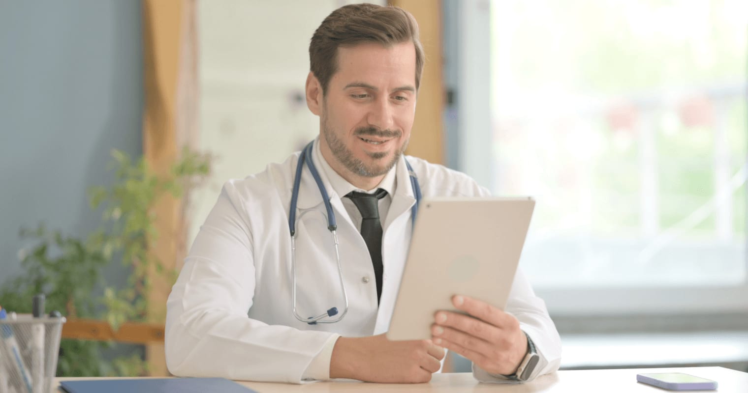 Doctor with tablet