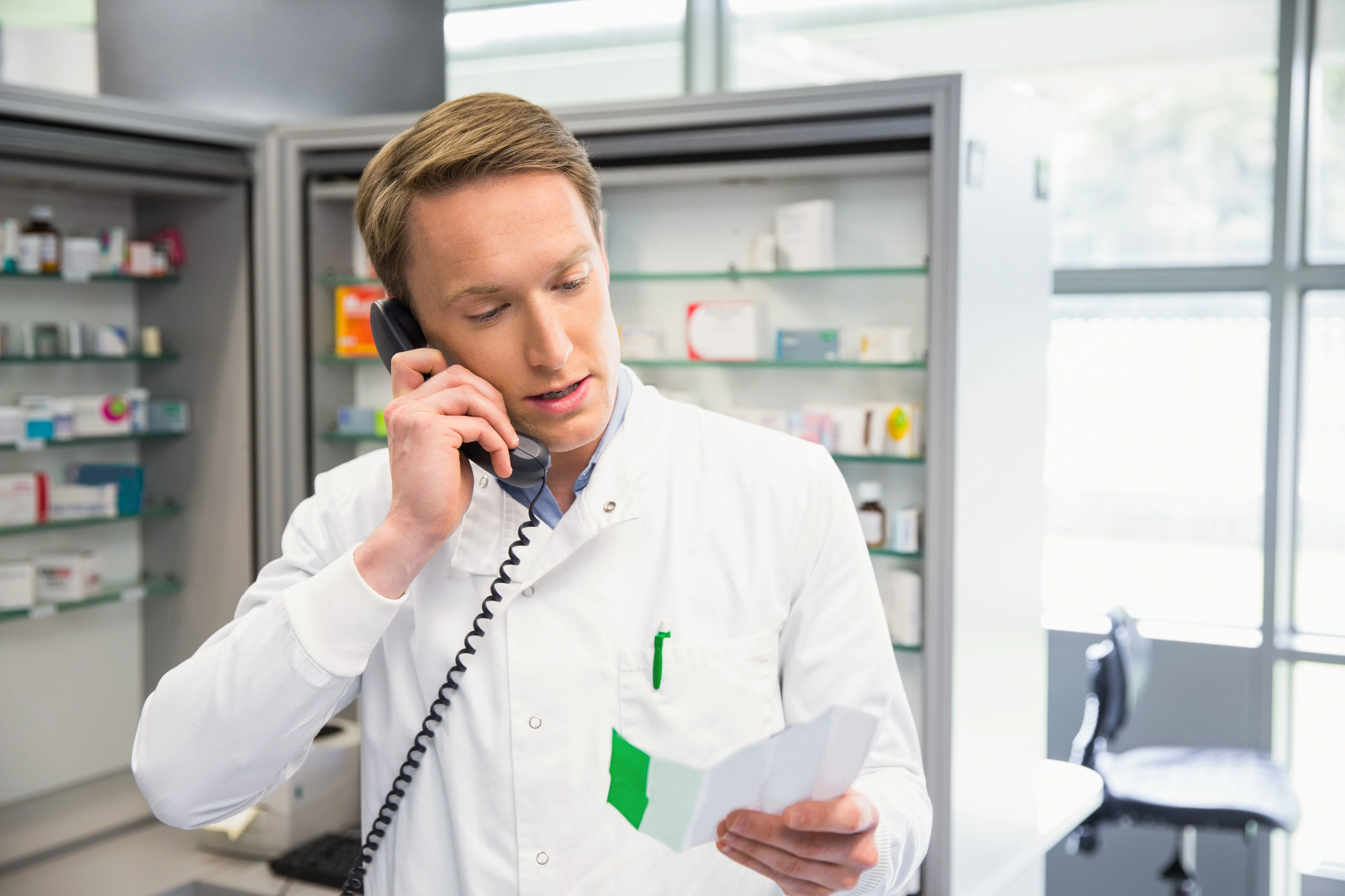 Happy pharmacist on phone