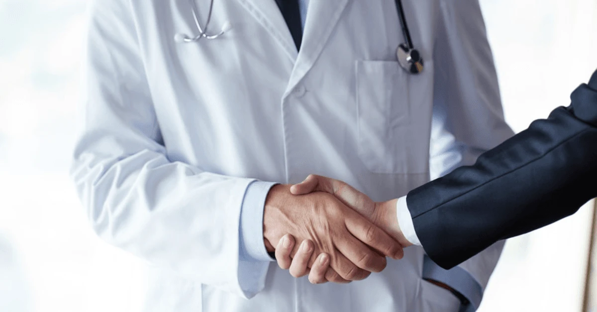 doctor patient handshake