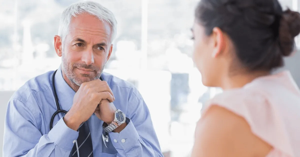 doctor listening to patient