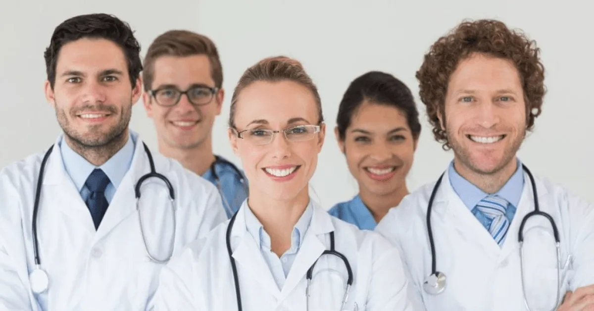 Happy Doctors posing for camera