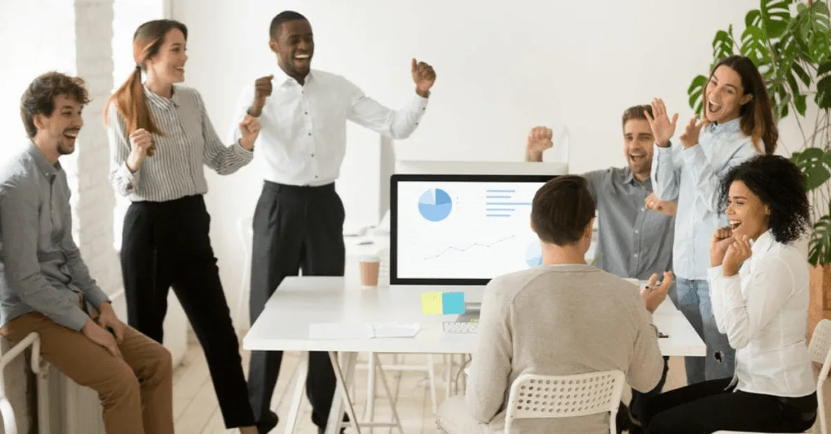 employees celebrating at office