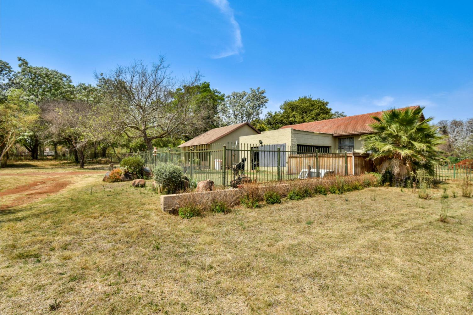 Spacious 1.6128 hectare agricultural plot with three dwellings and approved second dwelling rights for sale in Kameeldrift East