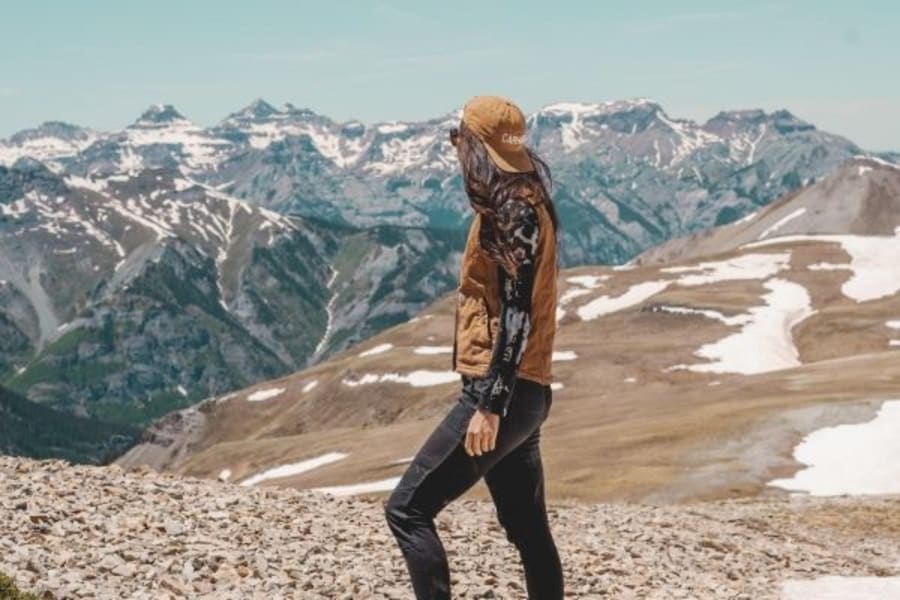 Woman looking at Colorado mountain view