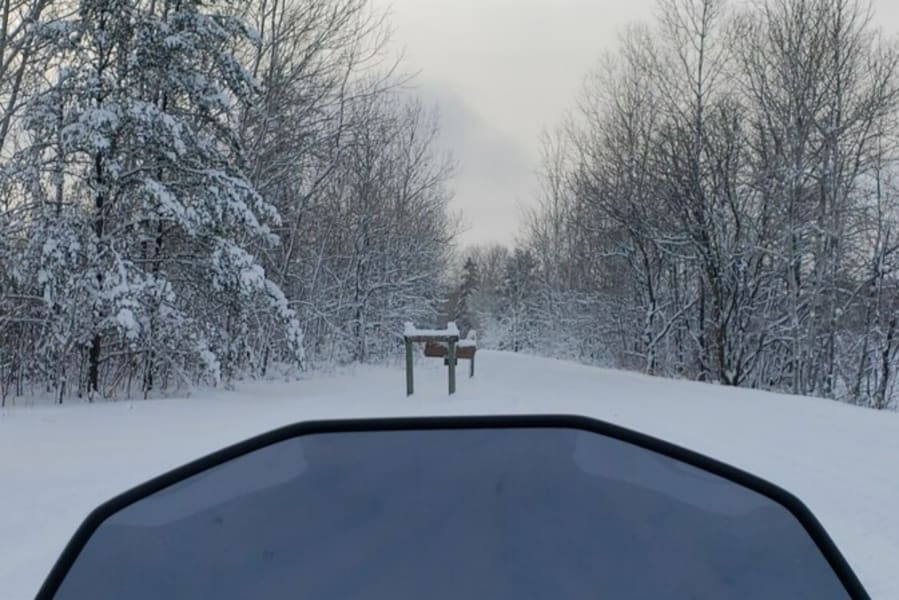 Driver's view from seat of Polaris snowmobile