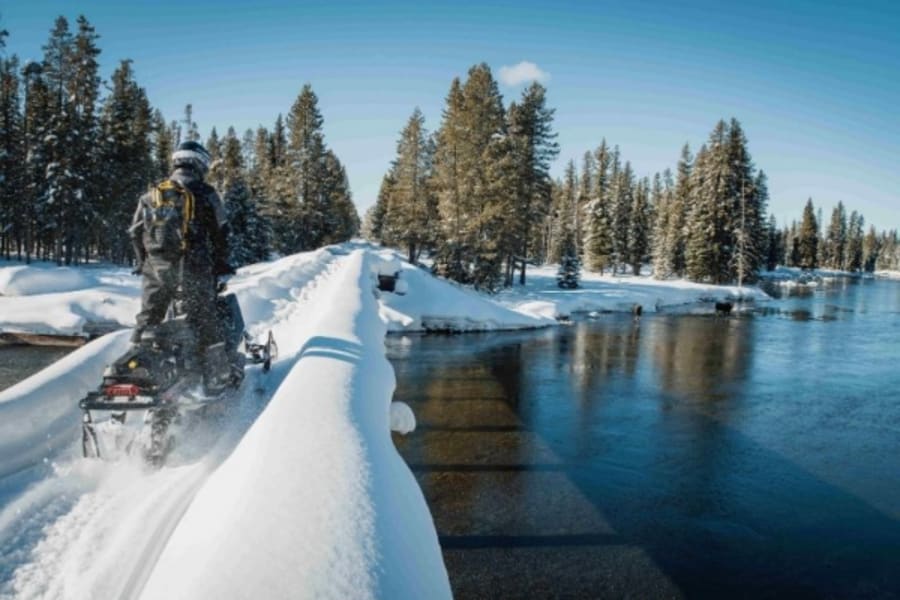 Snowmobiler in bridge in Idaho