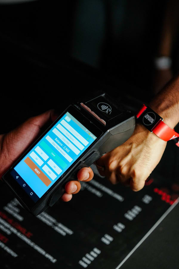Cashless payment system for events — live event crowd using NFC wristband payment
