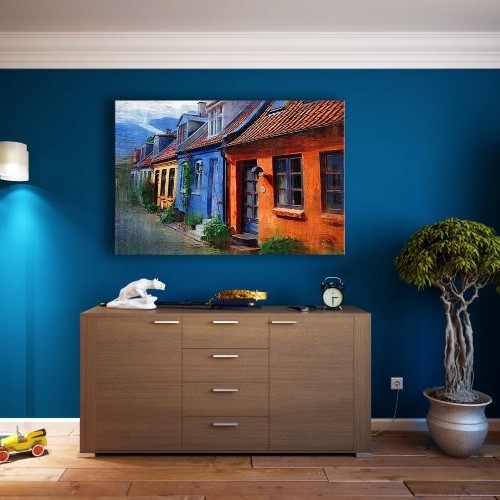 blue room with drawers and colourful painting