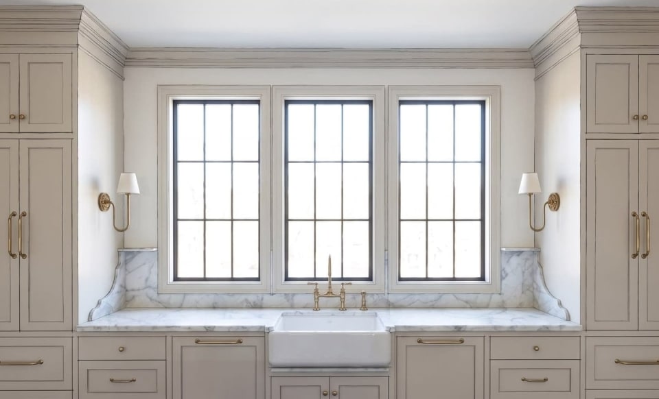 Rendering of the Beck kitchen window wall with a farmhouse sink and tall cabinets