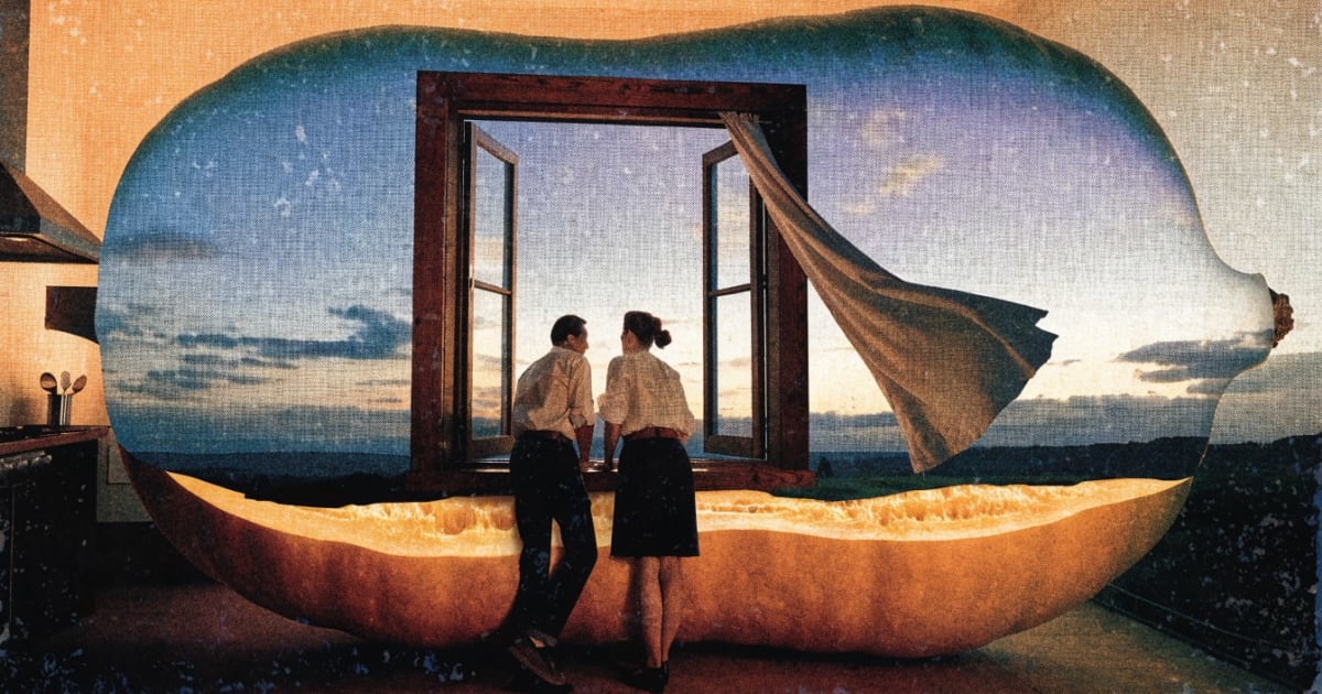 A couple stands at a kitchen window where a roasting butternut squash's skin blends into the dusk sky outside.