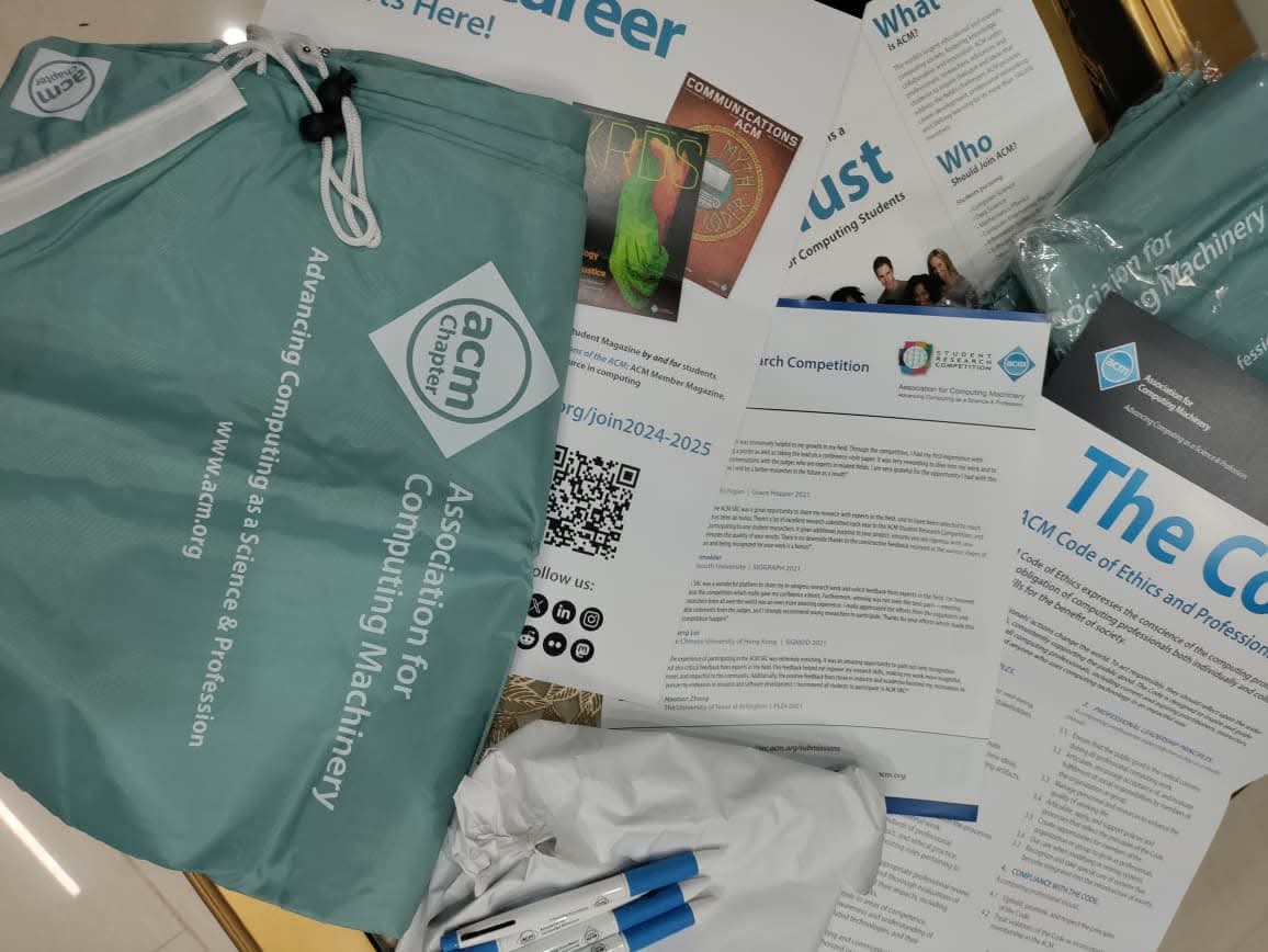 Members receiving ACM swag