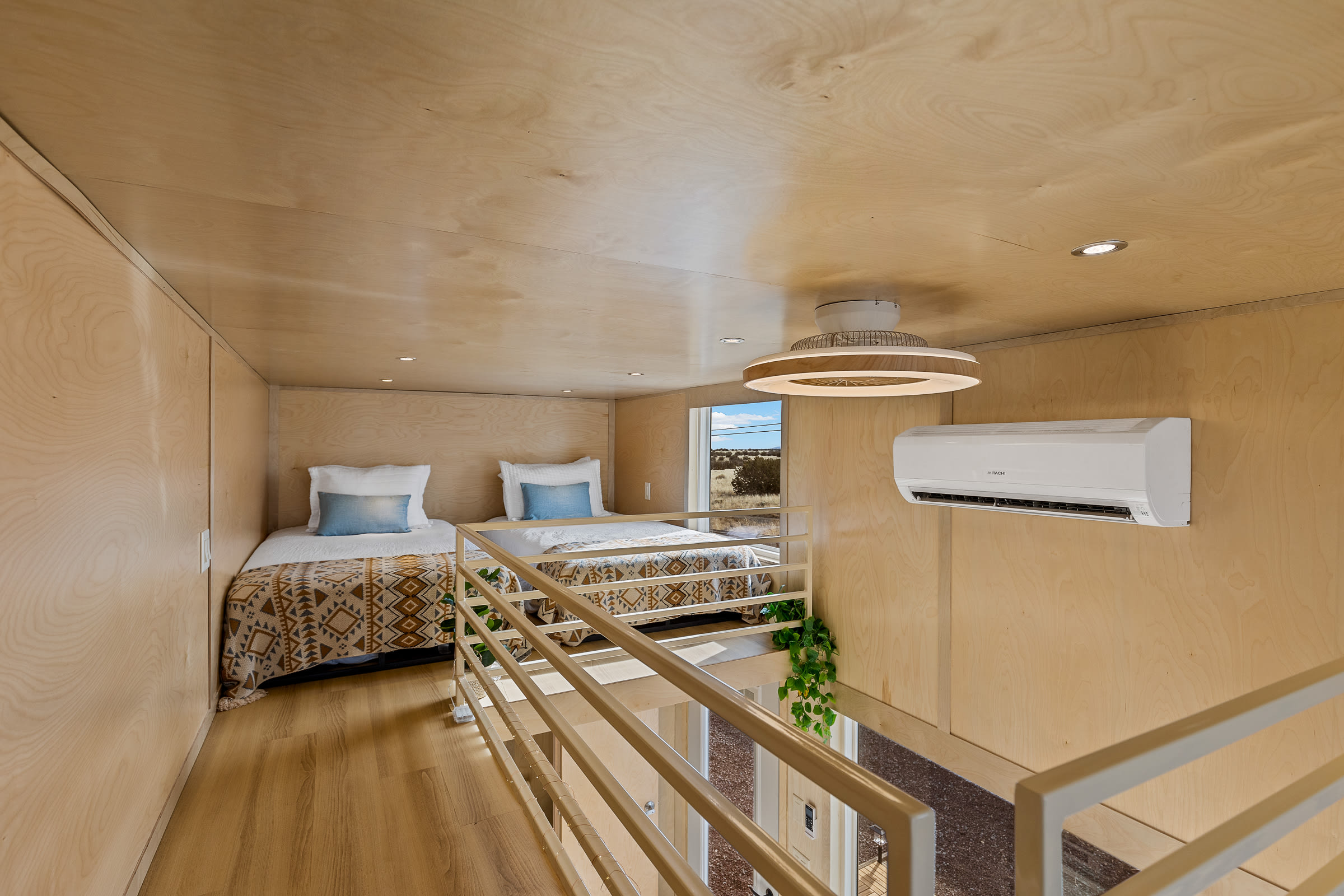 Catwalk leading to twin beds loft