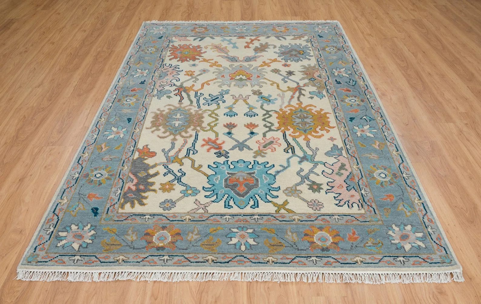 Handknotted Traditional Ivory and Blue Area Rug with Floral Medallion Design and Fringe Edges