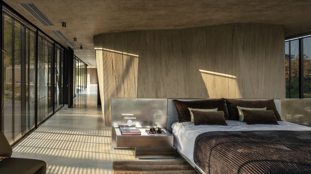 Casa Xingu — kitchen and dining extending to terrace