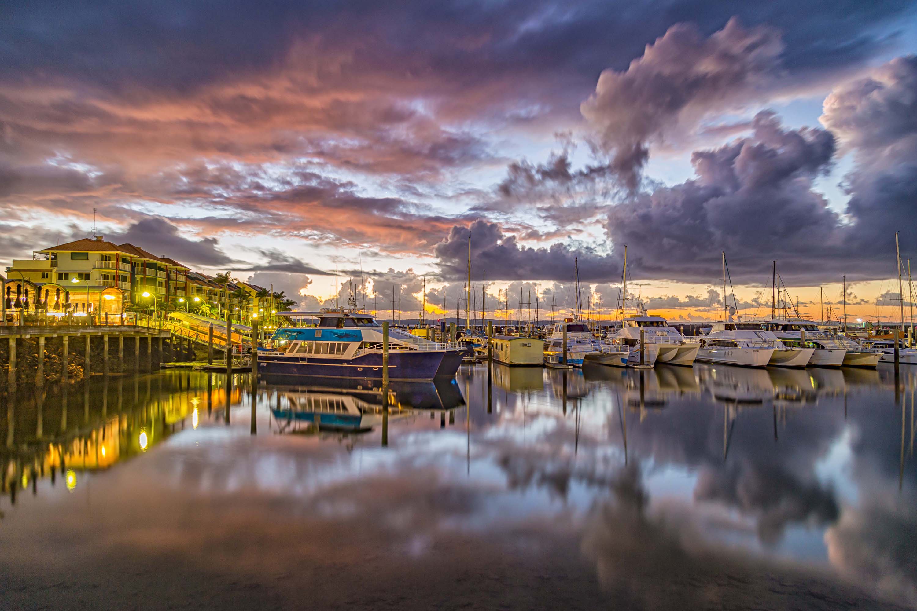 Urangan Marina at sunset, home to the Hervey Bay Whale Festival and Blessing of the Fleet