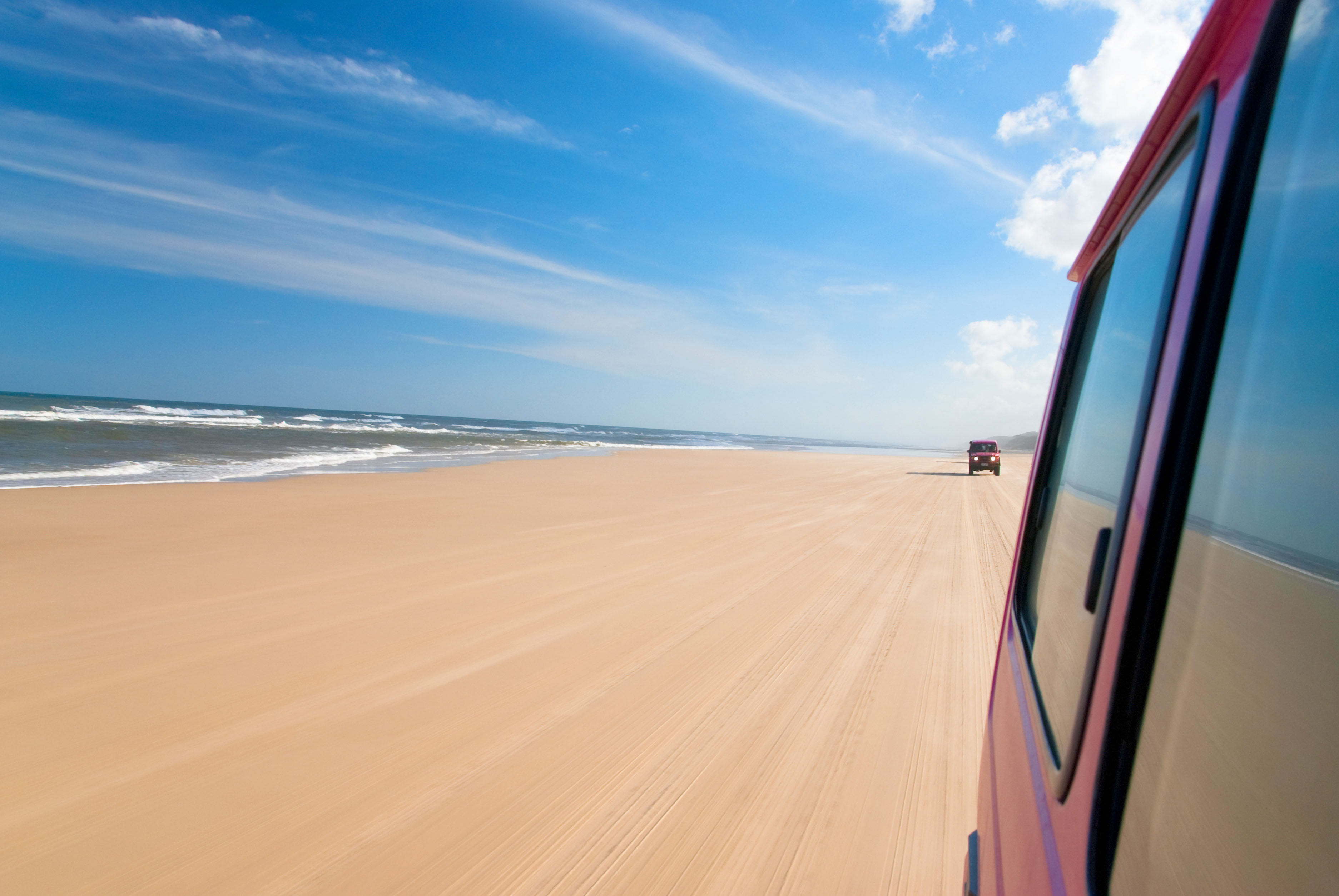 4WD driving on the beach at K'gari (Fraser Island)