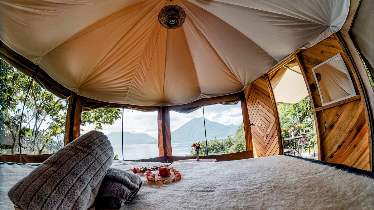 Aerial drone view of Fuego Atitlan eco-glamping on Lake Atitlan, Guatemala