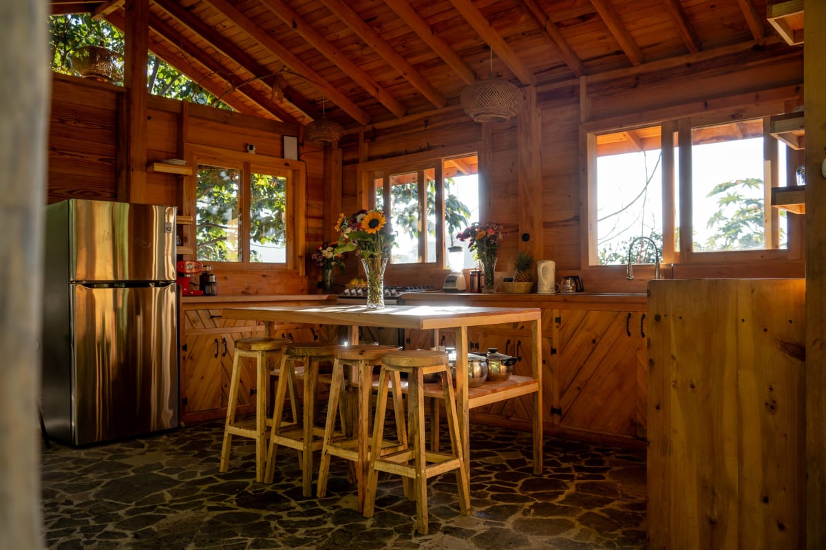 Fully equipped shared kitchen at Fuego Atitlán — gathering space for digital nomads