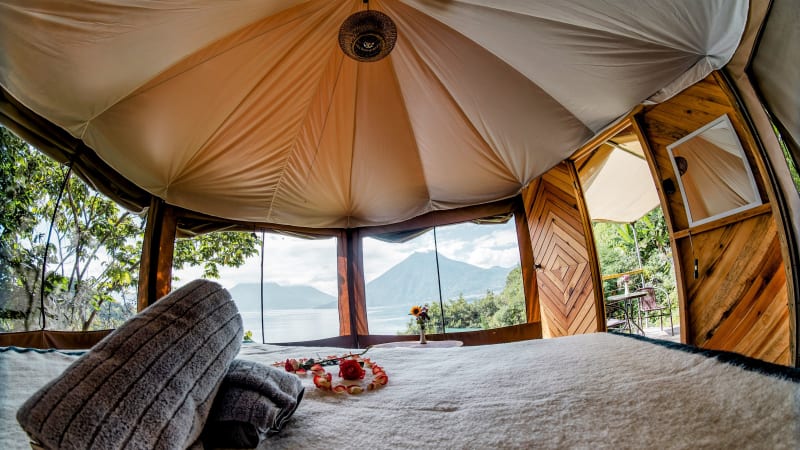 Aerial drone view of Fuego Atitlan eco-glamping on Lake Atitlan, Guatemala