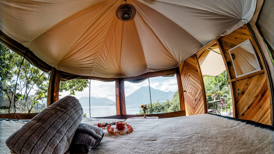 Aerial drone view of Fuego Atitlan eco-glamping on Lake Atitlan, Guatemala