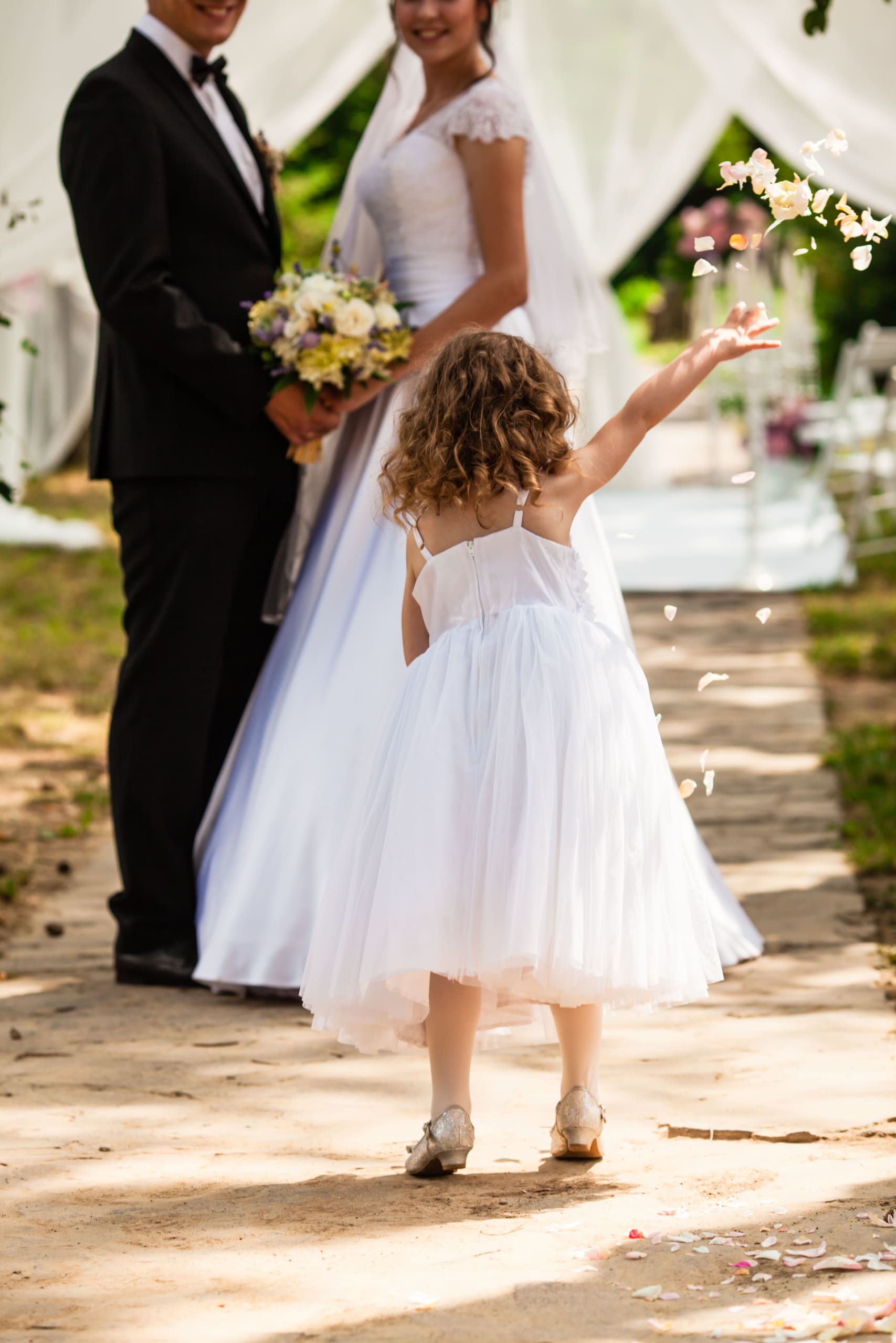 wedding-flying-rose-petals-from-kids-at-ceremony-2022-03-26-23-21-04-utc