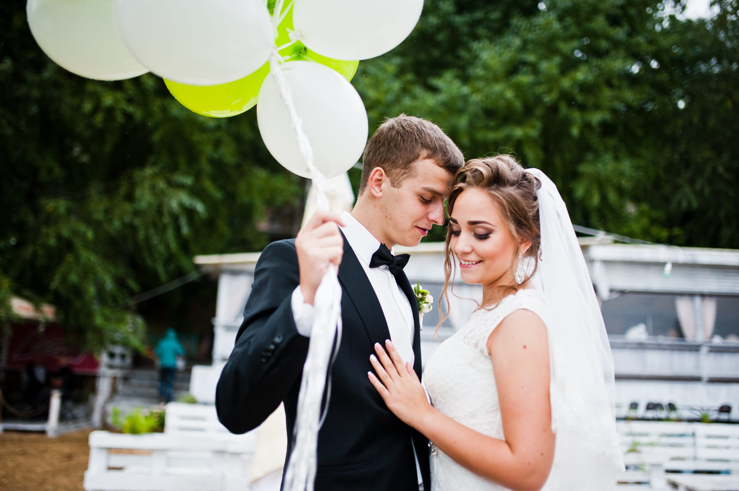 wedding-couple-with-balloons-at-hands-background-b-2022-02-17-23-10-19-utc