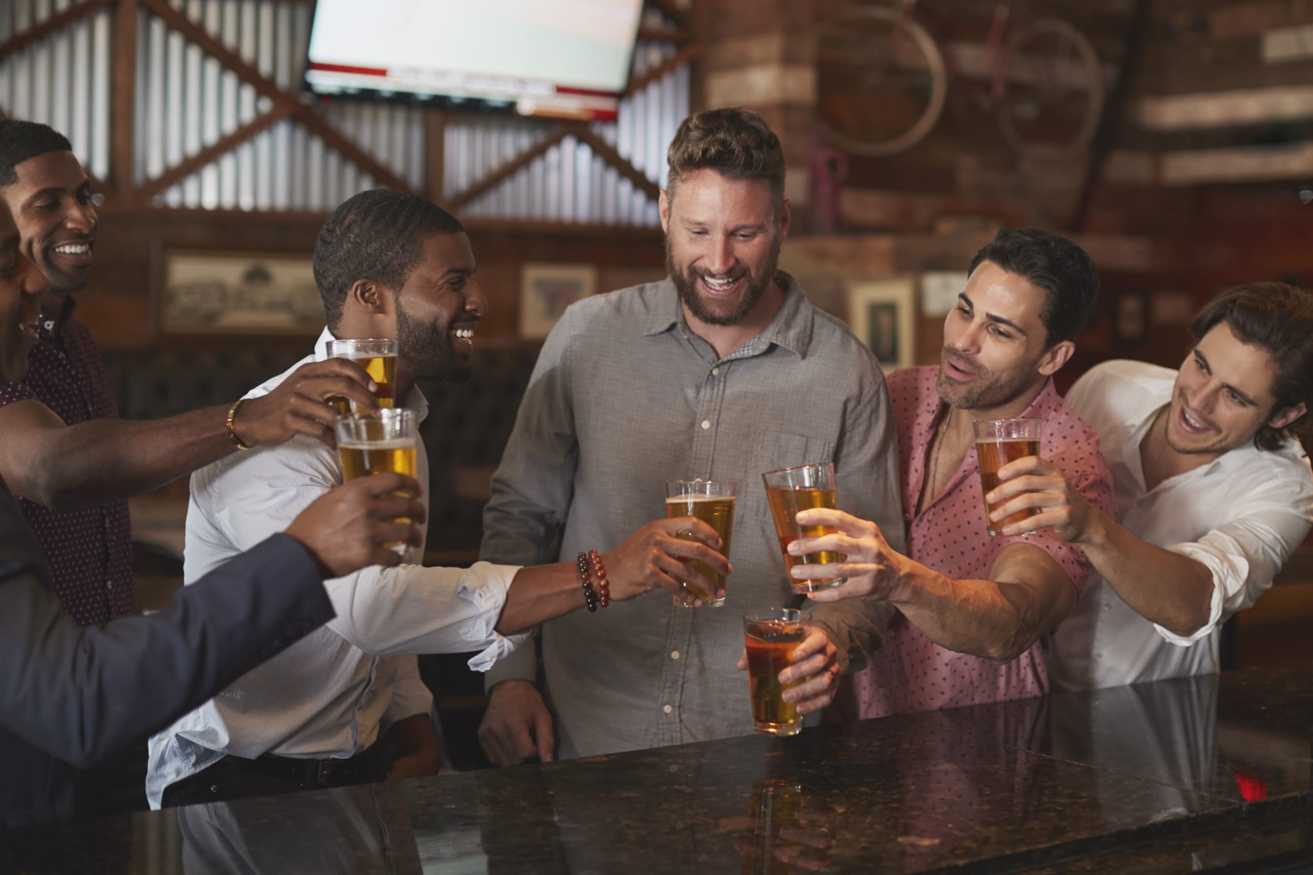 group-of-male-friends-on-night-out-for-bachelor-pa-2021-08-26-16-14-38-utc