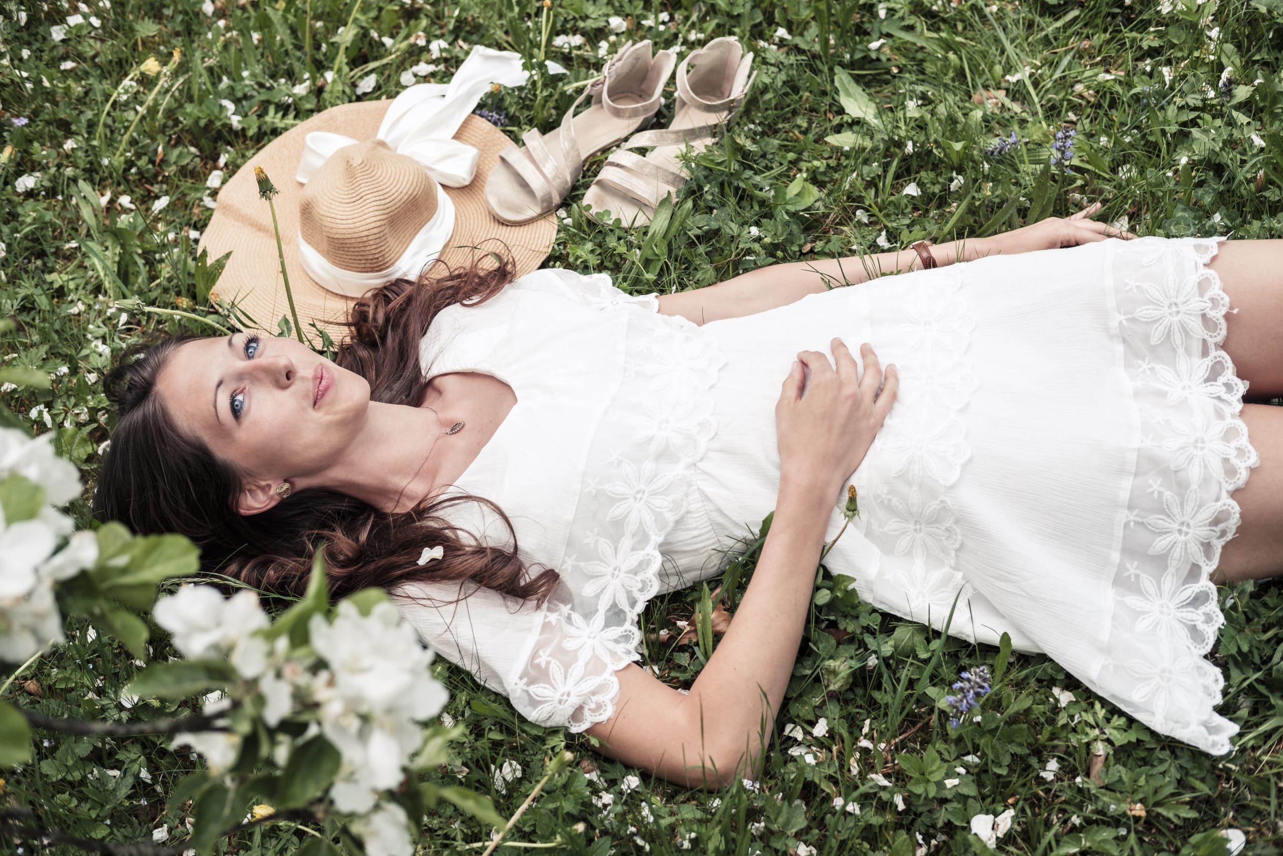 portrait-of-daydreaming-young-woman-wearing-white-2022-01-24-23-27-49-utc