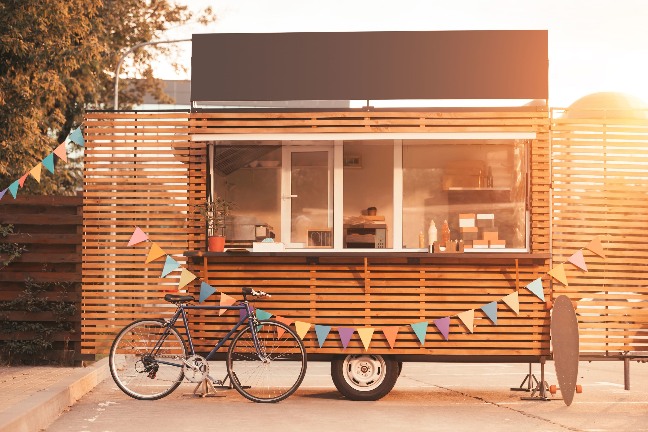 food-truck-with-bicycle-during-sunset-2021-08-29-22-37-11-utc