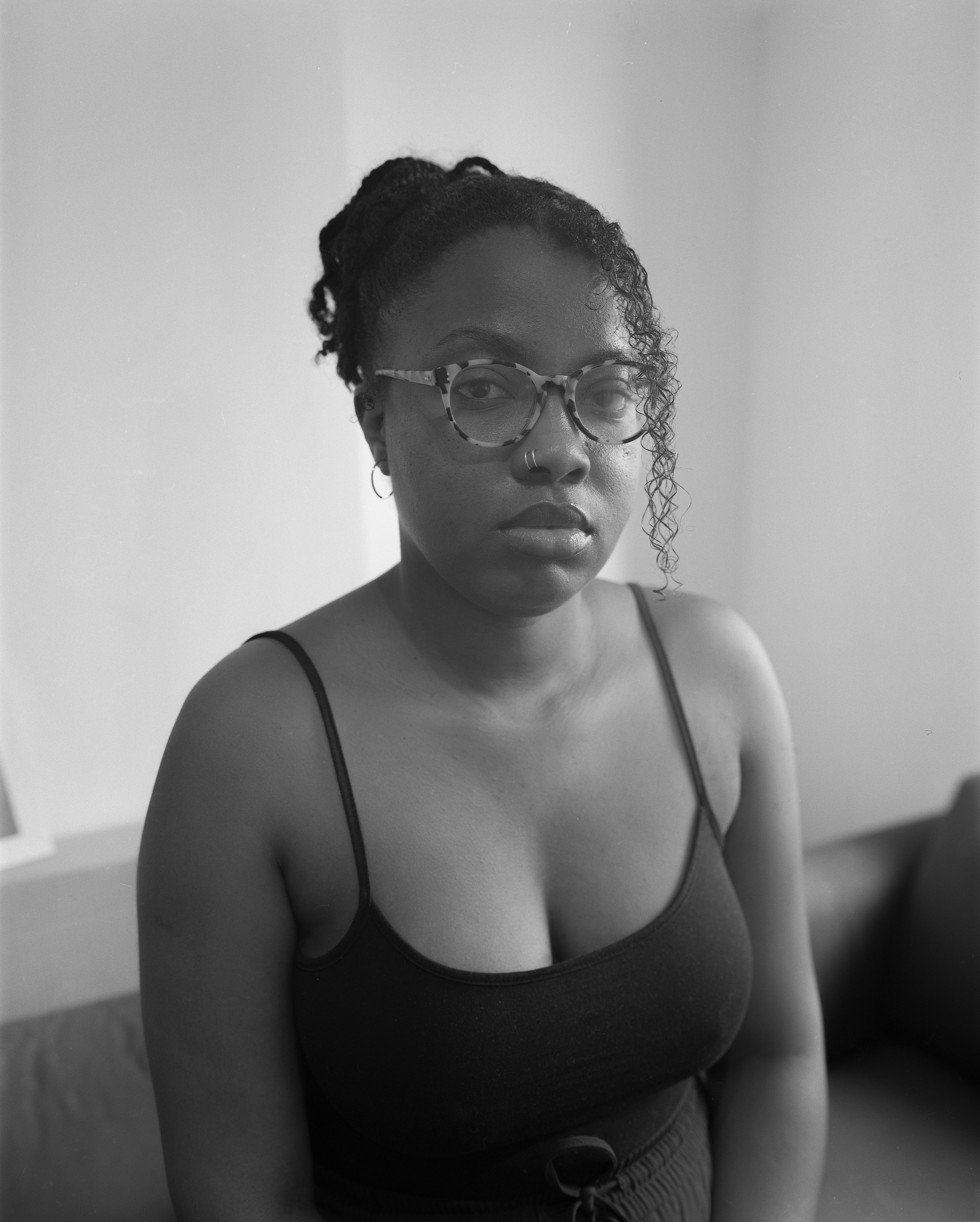 A black and white portrait of lola odelola