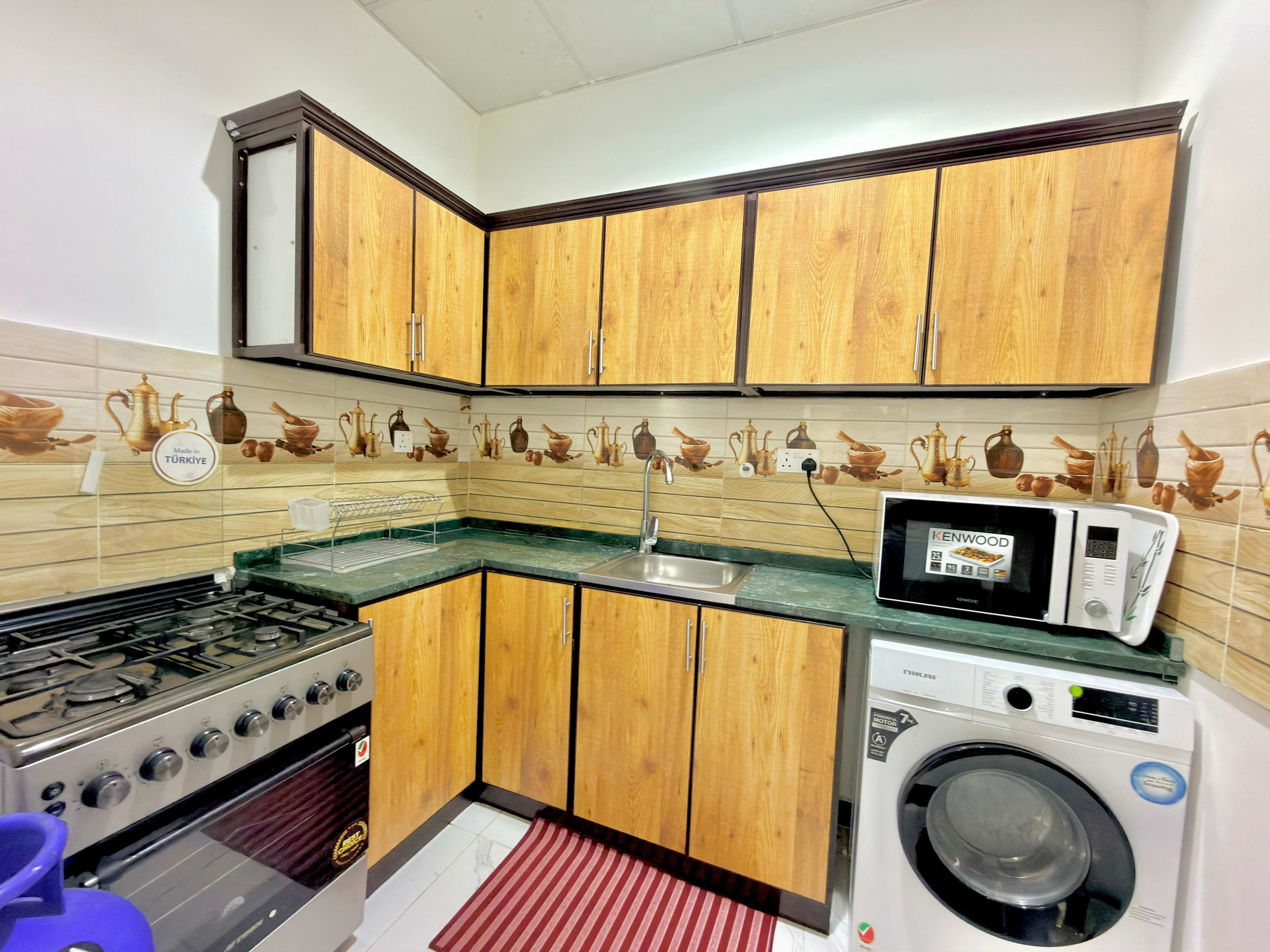Fully Furnished Studio with Private Backyard — Opposite Mushrif Mall - photo 7