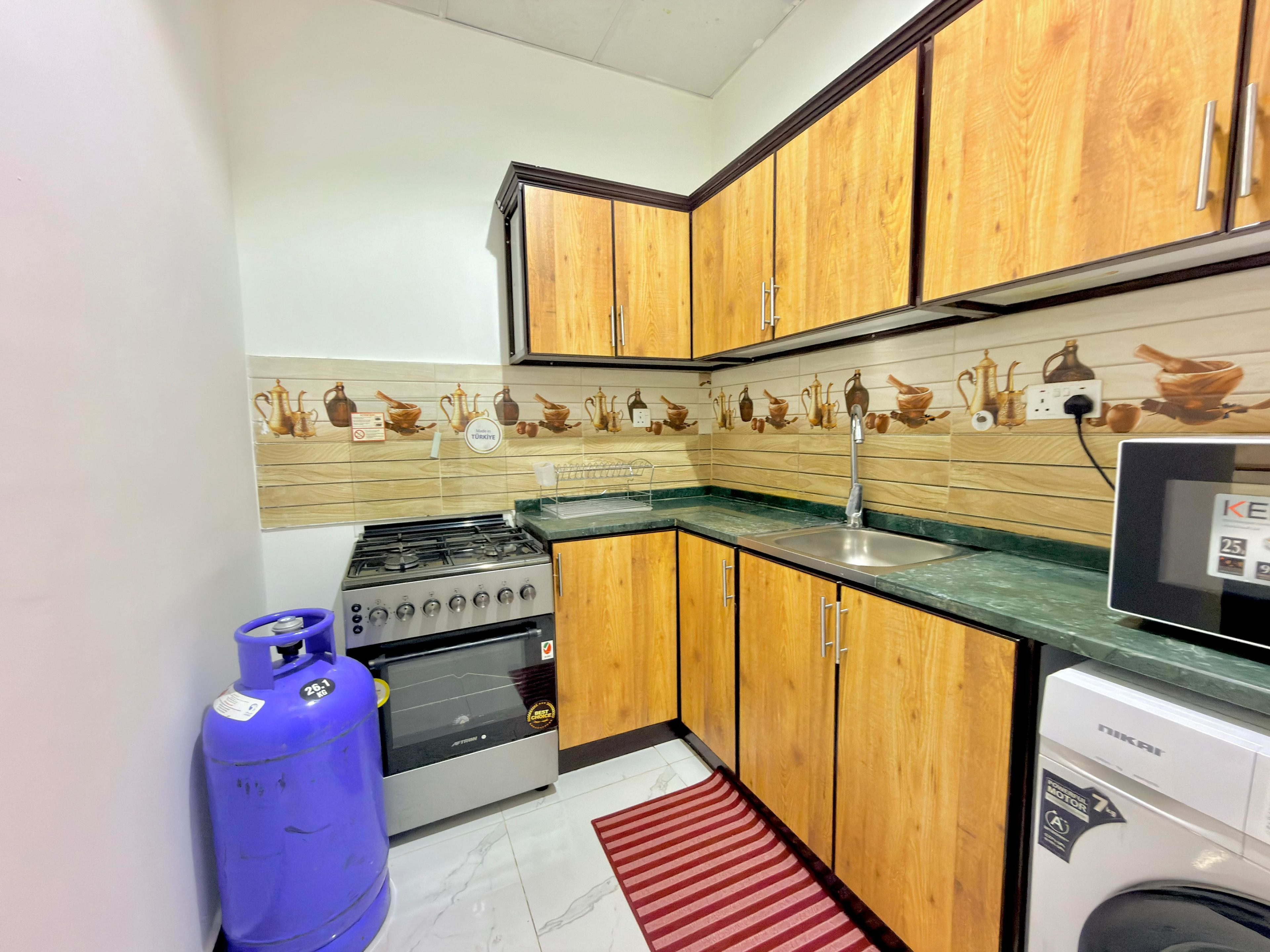 Fully Furnished Studio with Private Backyard — Opposite Mushrif Mall - photo 9