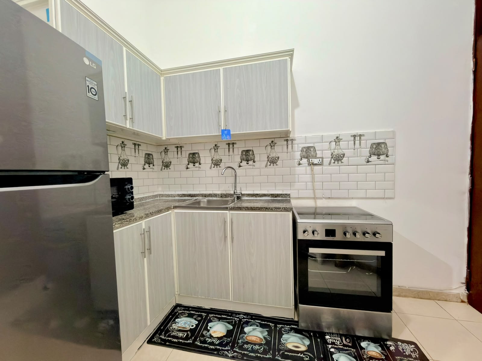Fully Furnished Studio with Private Backyard — Opposite Mushrif Mall - photo 14