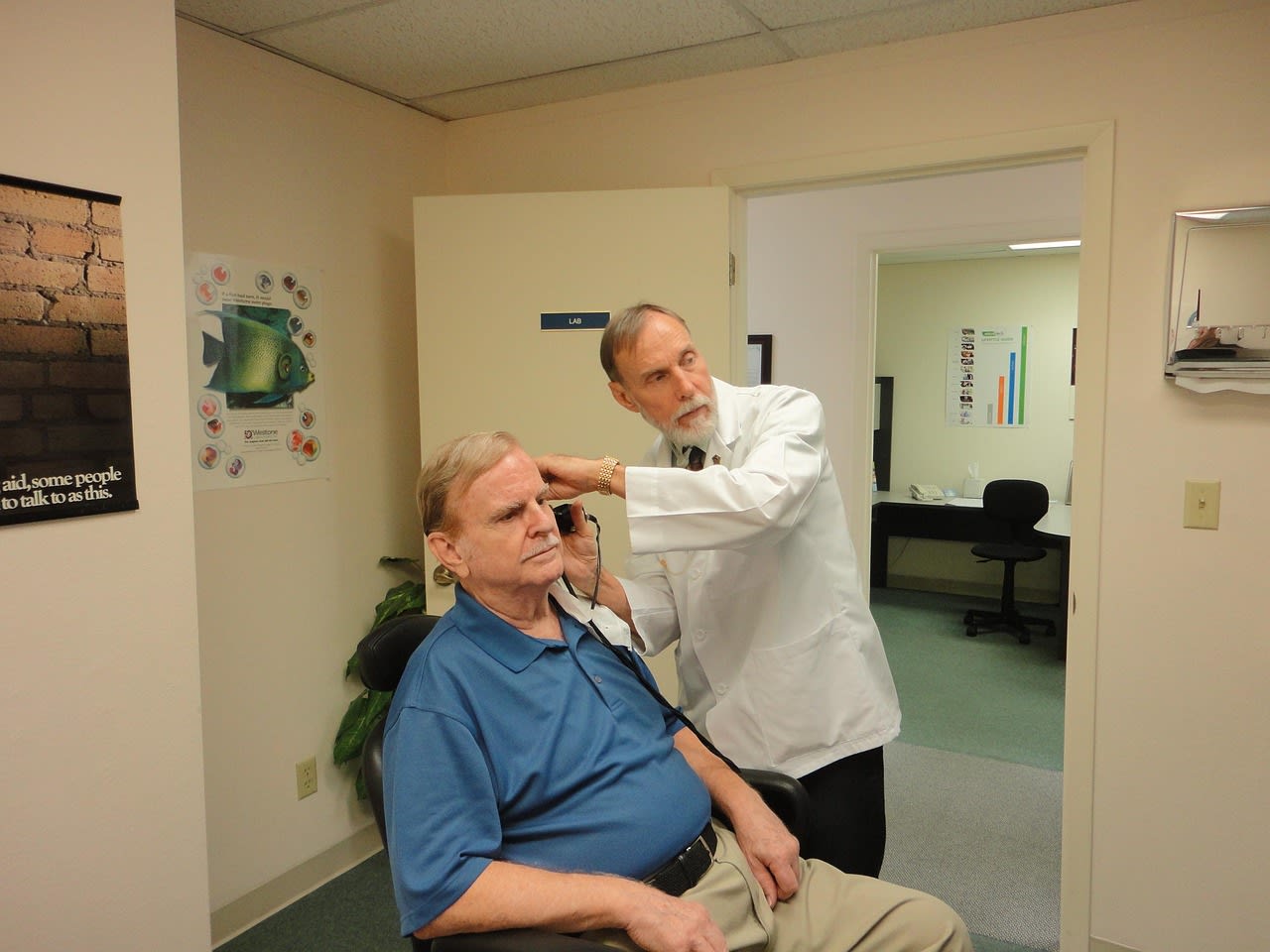 Photo of man getting Hearing Exams. 