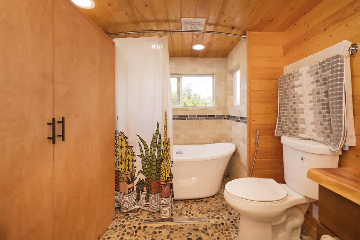 big bathroom with all conveniences and lots of storage, including tub, washer/dryer, bidet ...