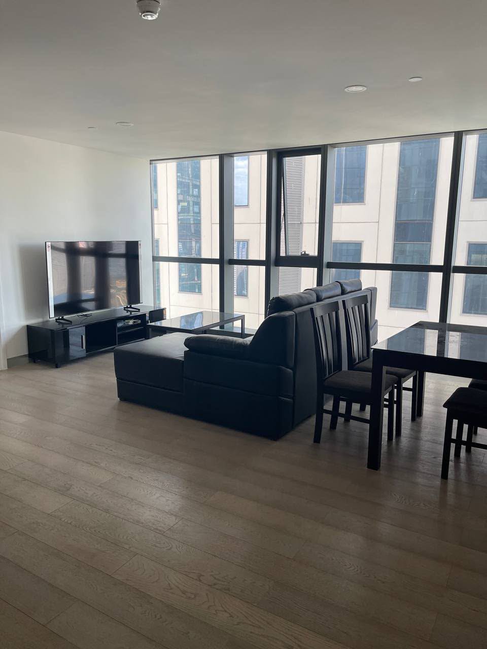 33rd-floor 1-bedroom corner residence with floor-to-ceiling city views