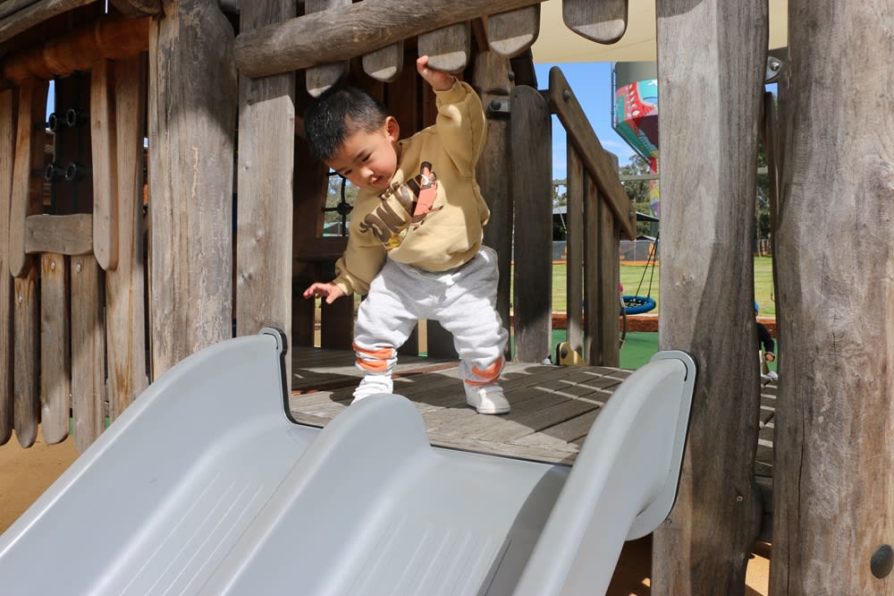 The community enjoying the new playground at Mont St Quentin Oval Community Picnic August 2024