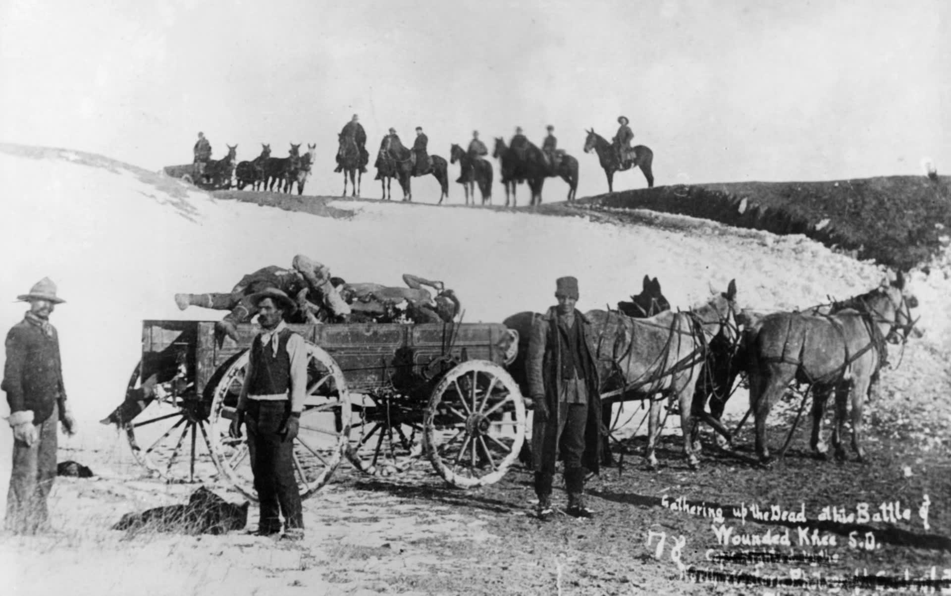 After the 1890 massacre at Wounded Knee, a burial party came to collect the deceased. After the 1890 massacre at Wounded Knee, a burial party came to collect the deceased.